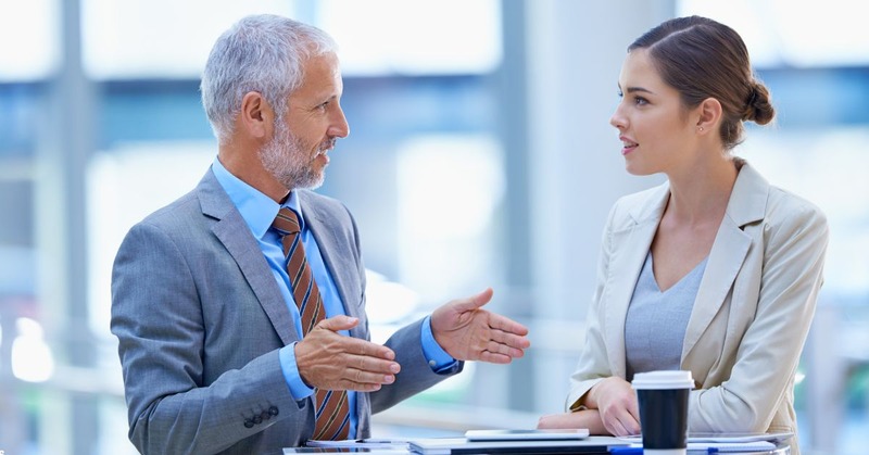 a man explaining to a lady