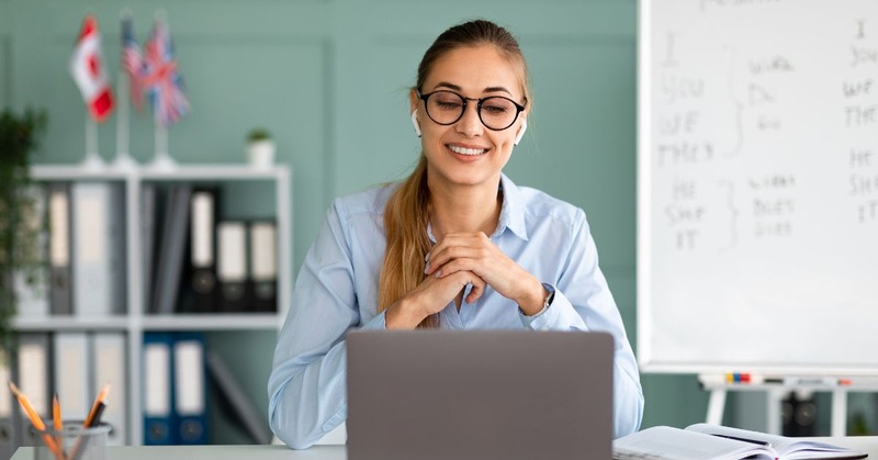 a woman that's looking through her laptop